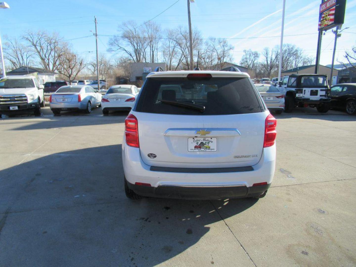 2016 WHITE CHEVROLET EQUINOX LTZ (2GNALDEK2G6) with an 2.4L engine, Automatic transmission, located at 908 SE 14th Street, Des Moines, IA, 50317, (515) 281-0330, 41.580303, -93.597046 - Photo#5