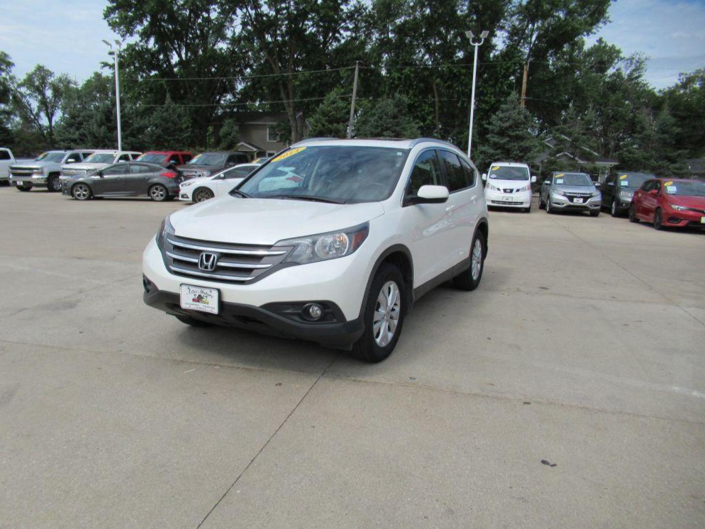 2014 WHITE HONDA CR-V EXL (5J6RM4H78EL) with an 2.4L engine, Automatic transmission, located at 908 SE 14th Street, Des Moines, IA, 50317, (515) 281-0330, 41.580303, -93.597046 - Photo#0