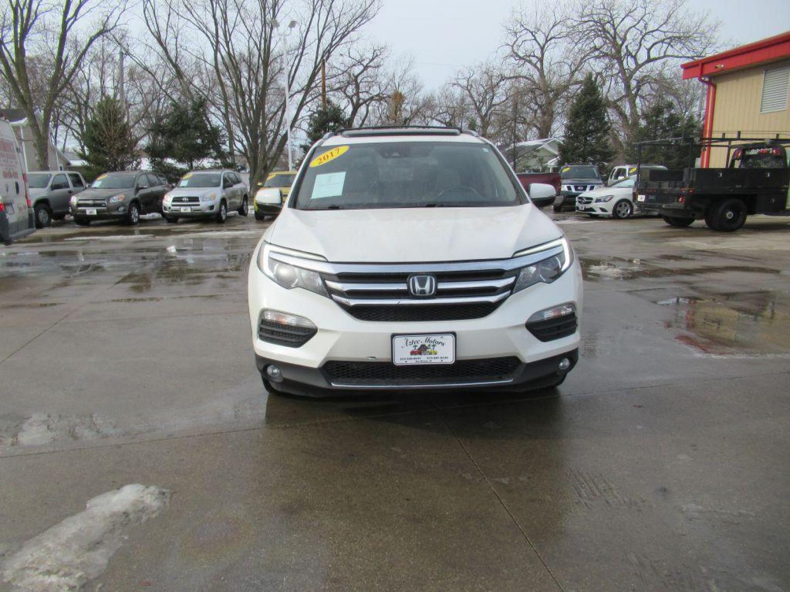 2017 WHITE HONDA PILOT ELITE (5FNYF6H05HB) with an 3.5L engine, Automatic transmission, located at 908 SE 14th Street, Des Moines, IA, 50317, (515) 281-0330, 41.580303, -93.597046 - Photo #1