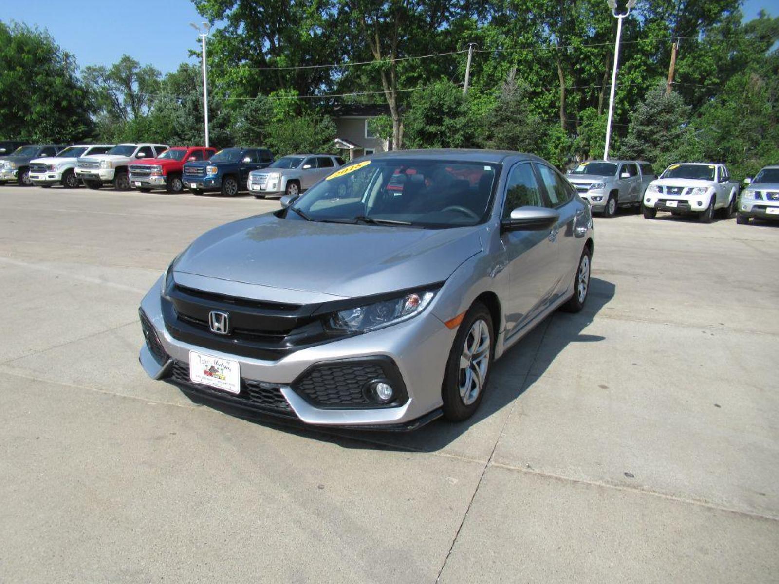 2018 SILVER HONDA CIVIC LX (19XFC2F59JE) with an 2.0L engine, Continuously Variable transmission, located at 908 SE 14th Street, Des Moines, IA, 50317, (515) 281-0330, 41.580303, -93.597046 - Photo #0