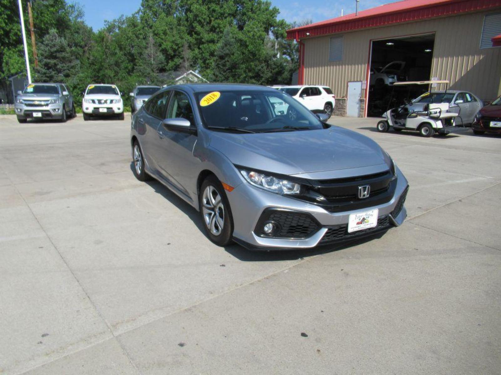 2018 SILVER HONDA CIVIC LX (19XFC2F59JE) with an 2.0L engine, Continuously Variable transmission, located at 908 SE 14th Street, Des Moines, IA, 50317, (515) 281-0330, 41.580303, -93.597046 - Photo #2
