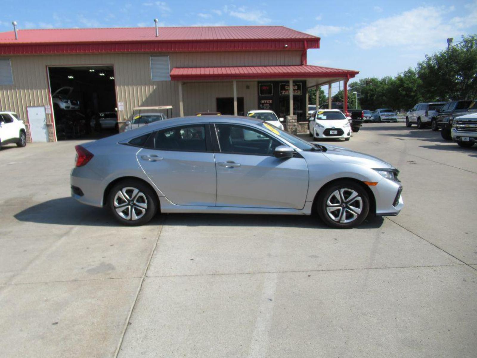 2018 SILVER HONDA CIVIC LX (19XFC2F59JE) with an 2.0L engine, Continuously Variable transmission, located at 908 SE 14th Street, Des Moines, IA, 50317, (515) 281-0330, 41.580303, -93.597046 - Photo #3