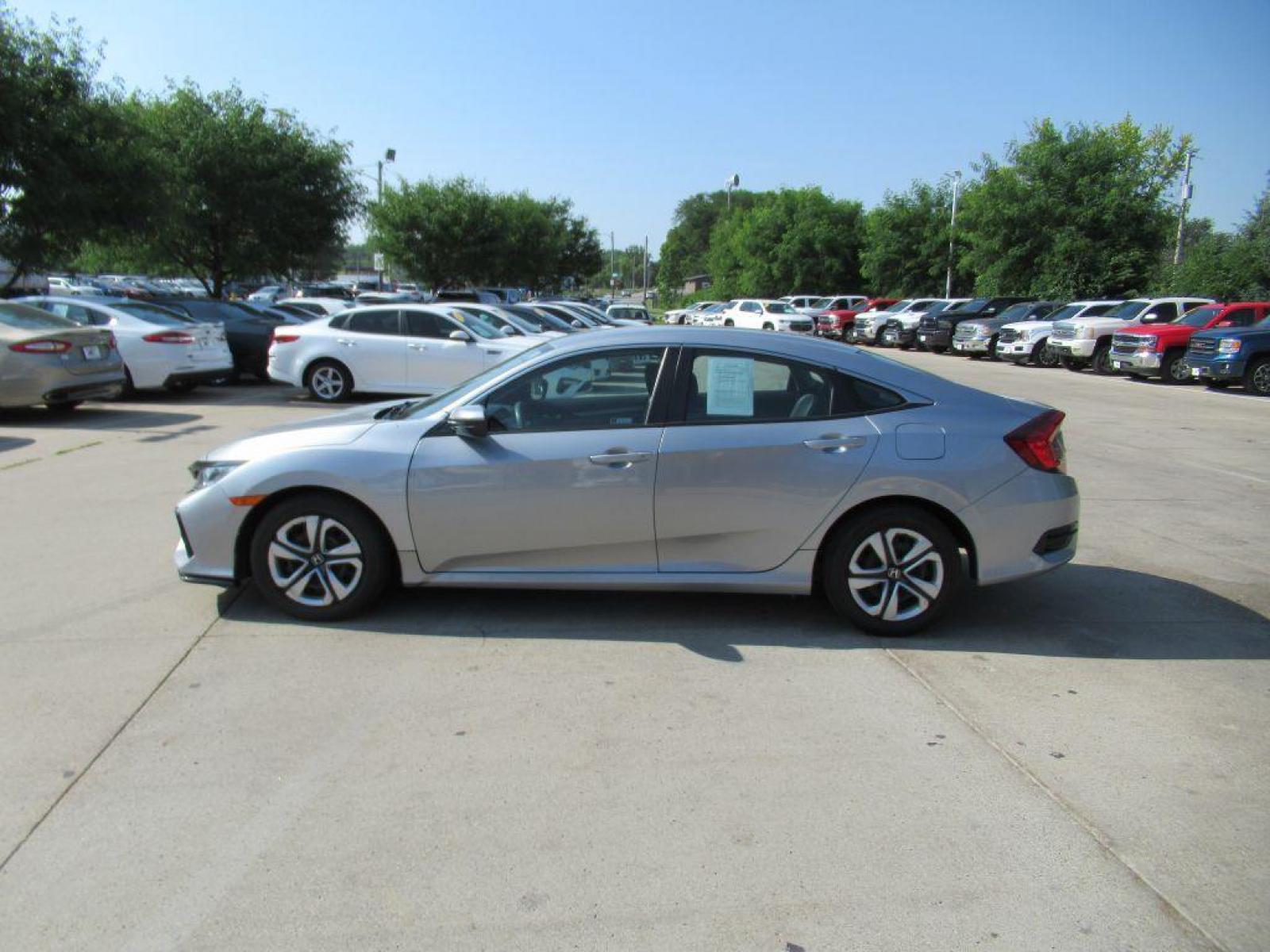 2018 SILVER HONDA CIVIC LX (19XFC2F59JE) with an 2.0L engine, Continuously Variable transmission, located at 908 SE 14th Street, Des Moines, IA, 50317, (515) 281-0330, 41.580303, -93.597046 - Photo #7