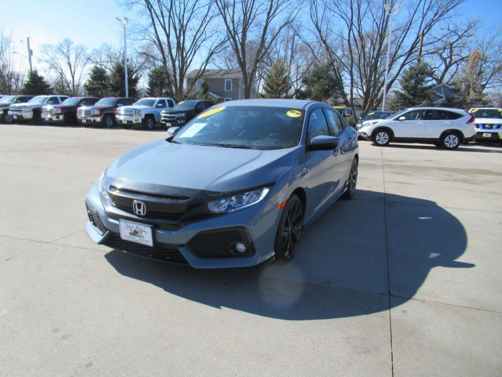 2018 GRAY HONDA CIVIC SPORT (SHHFK7G45JU) with an 1.5L engine, 6-Speed Manual transmission, located at 908 SE 14th Street, Des Moines, IA, 50317, (515) 281-0330, 41.580303, -93.597046 - Photo #0