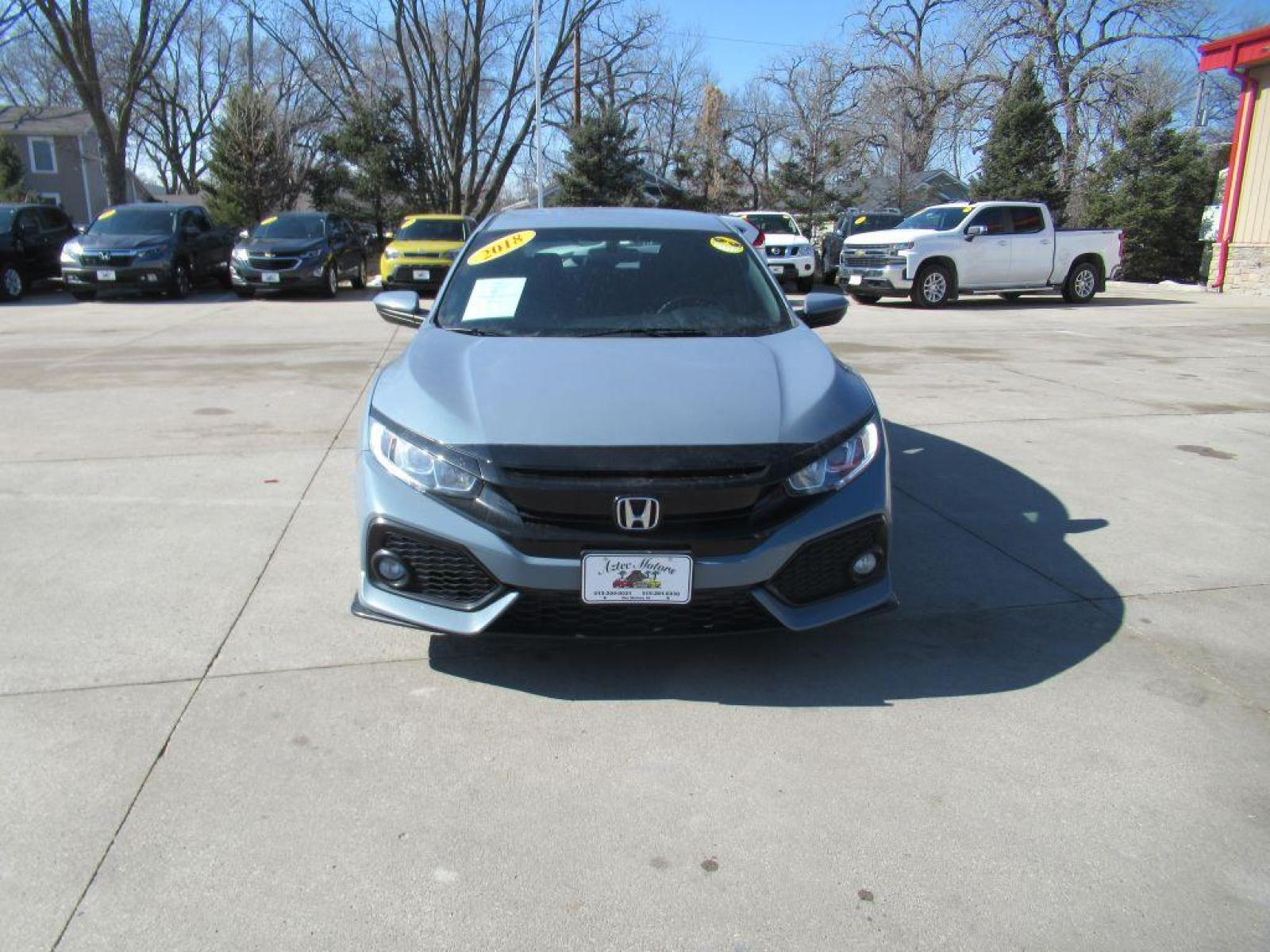2018 GRAY HONDA CIVIC SPORT (SHHFK7G45JU) with an 1.5L engine, 6-Speed Manual transmission, located at 908 SE 14th Street, Des Moines, IA, 50317, (515) 281-0330, 41.580303, -93.597046 - Photo #1