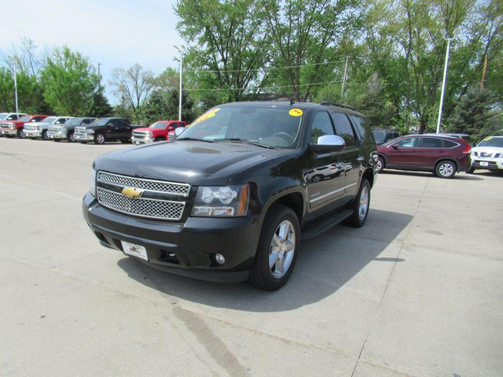 2013 BLACK CHEVROLET TAHOE 1500 LTZ (1GNSKCE04DR) with an 5.3L engine, Automatic transmission, located at 908 SE 14th Street, Des Moines, IA, 50317, (515) 281-0330, 41.580303, -93.597046 - Photo #0