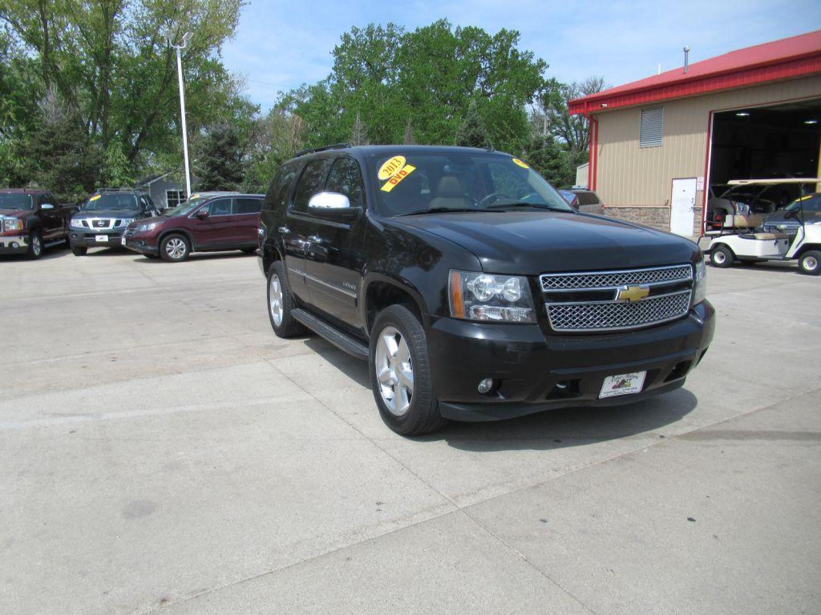 2013 BLACK CHEVROLET TAHOE 1500 LTZ (1GNSKCE04DR) with an 5.3L engine, Automatic transmission, located at 908 SE 14th Street, Des Moines, IA, 50317, (515) 281-0330, 41.580303, -93.597046 - Photo #2