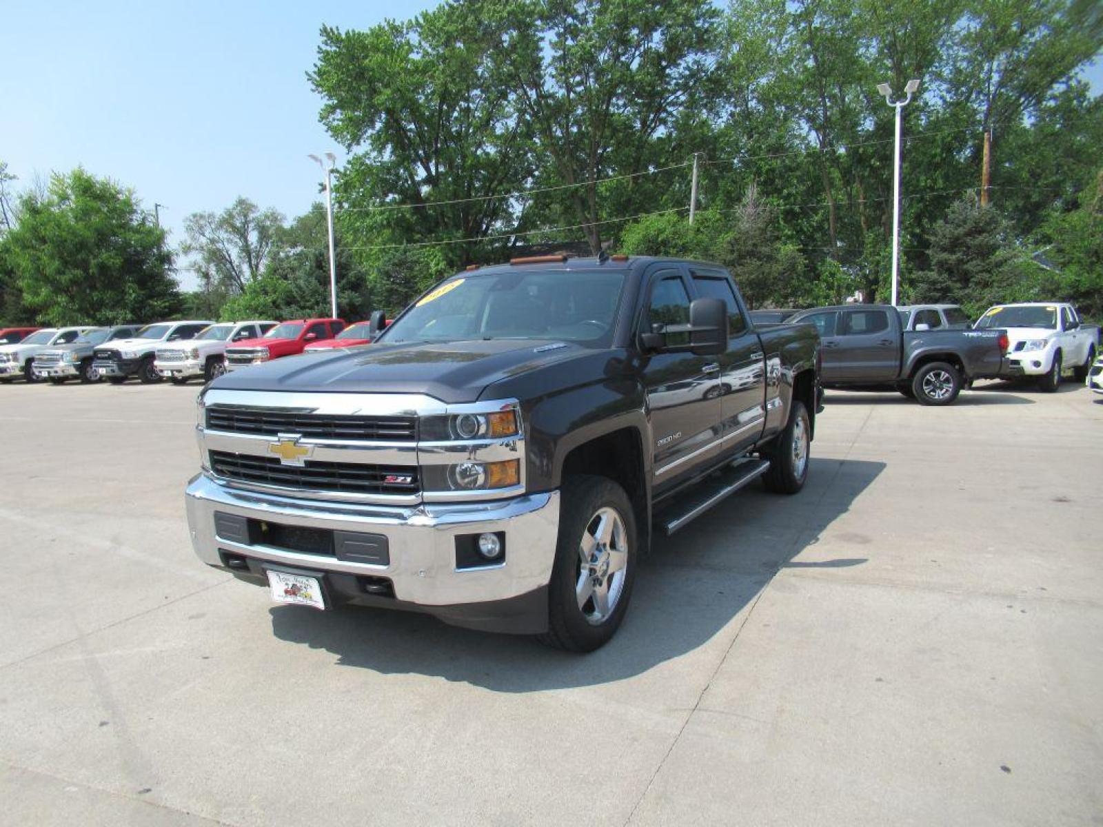 2015 GRAY CHEVROLET SILVERADO 2500 HEAVY DUTY LTZ (1GC1KWE8XFF) with an 6.6L engine, Automatic transmission, located at 908 SE 14th Street, Des Moines, IA, 50317, (515) 281-0330, 41.580303, -93.597046 - Photo #0