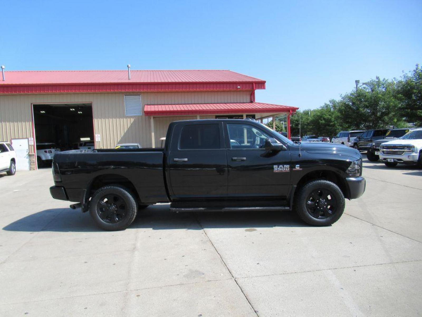 2017 BLACK RAM 3500 ST (3C63R3CL1HG) with an 6.7L engine, Automatic transmission, located at 908 SE 14th Street, Des Moines, IA, 50317, (515) 281-0330, 41.580303, -93.597046 - Photo #3