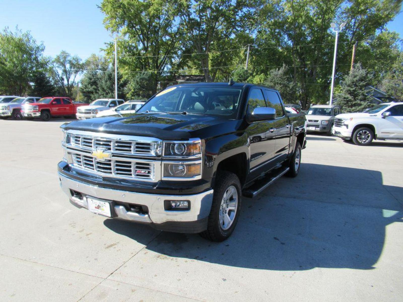 2015 BLACK CHEVROLET SILVERADO 1500 LTZ (3GCUKSEC1FG) with an 5.3L engine, Automatic transmission, located at 908 SE 14th Street, Des Moines, IA, 50317, (515) 281-0330, 41.580303, -93.597046 - Photo #0
