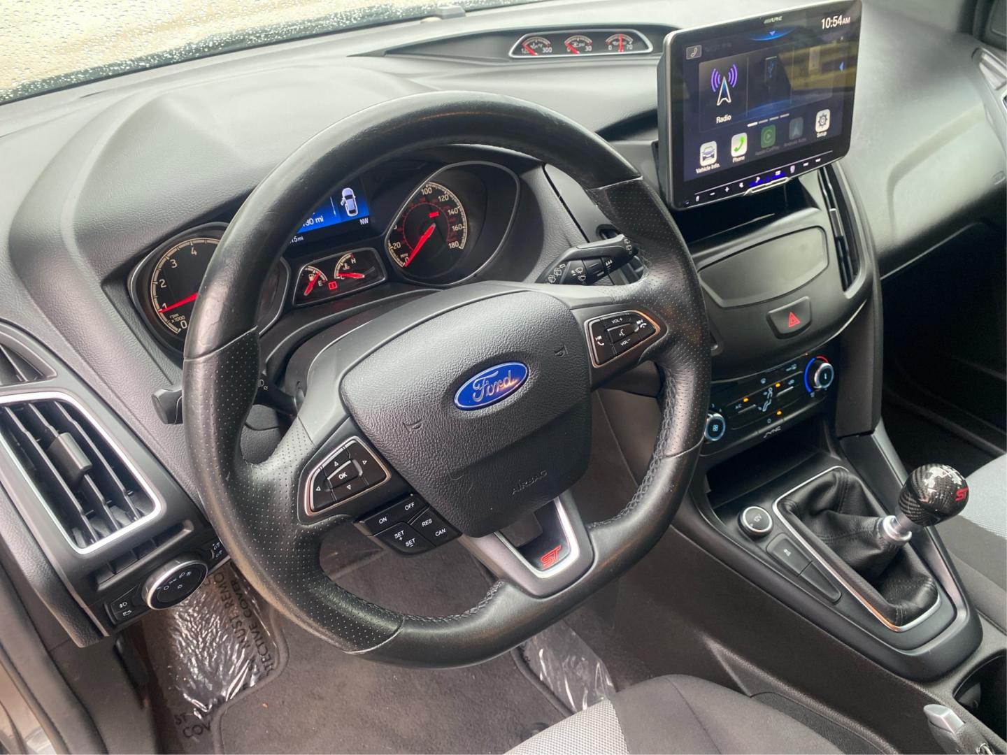 2016 GRAY FORD FOCUS ST (1FADP3L92GL) with an 2.0L engine, 6-Speed Manual transmission, located at 908 SE 14th Street, Des Moines, IA, 50317, (515) 281-0330, 41.580303, -93.597046- Photo#16