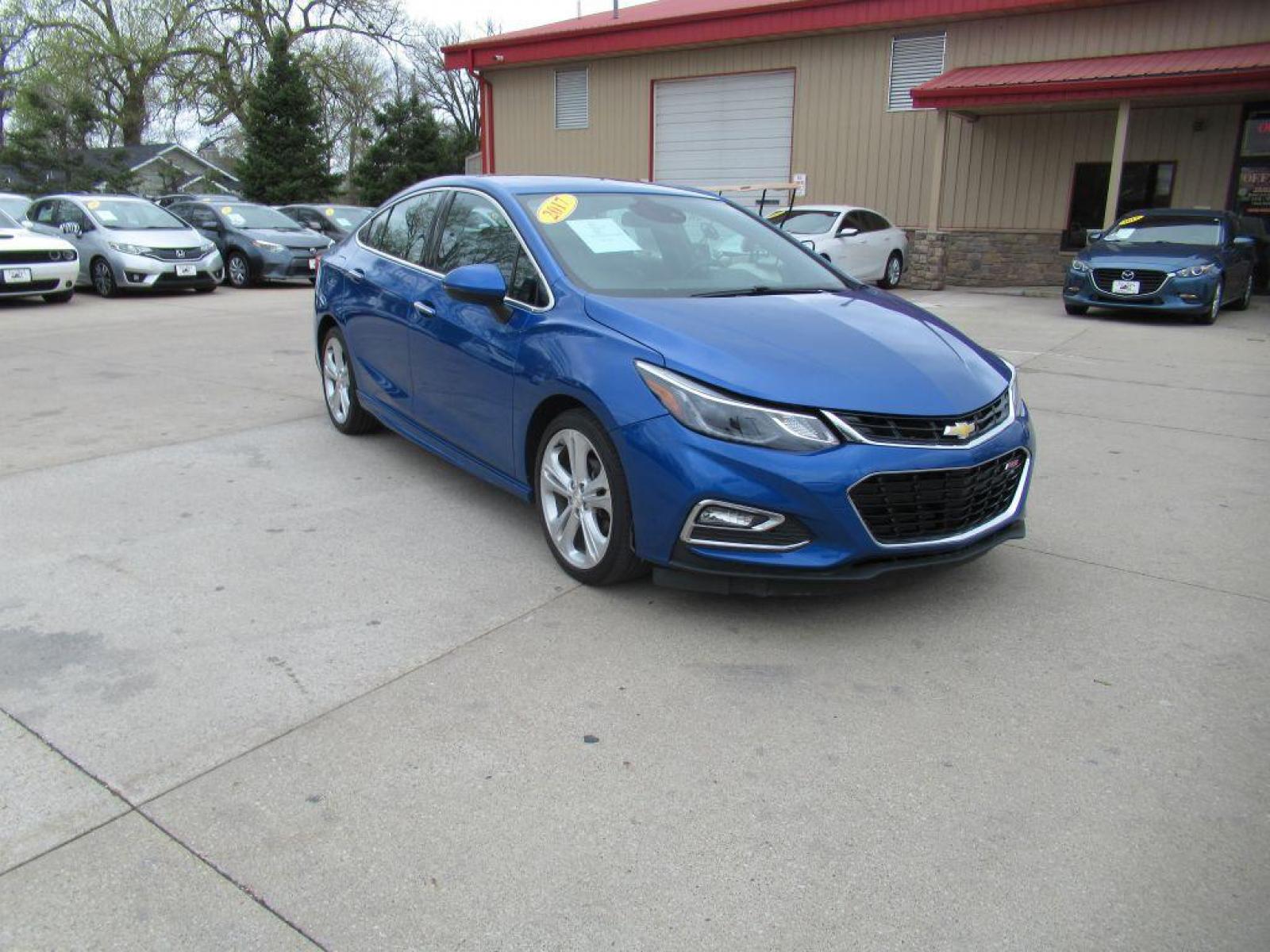 2017 BLUE CHEVROLET CRUZE PREMIER (1G1BF5SM0H7) with an 1.4L engine, Automatic transmission, located at 908 SE 14th Street, Des Moines, IA, 50317, (515) 281-0330, 41.580303, -93.597046 - Photo #2