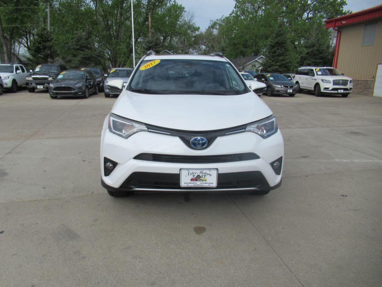 2017 WHITE TOYOTA RAV4 HV LE (JTMRJREV1HD) with an 2.5L engine, Continuously Variable transmission, located at 908 SE 14th Street, Des Moines, IA, 50317, (515) 281-0330, 41.580303, -93.597046 - Photo #1
