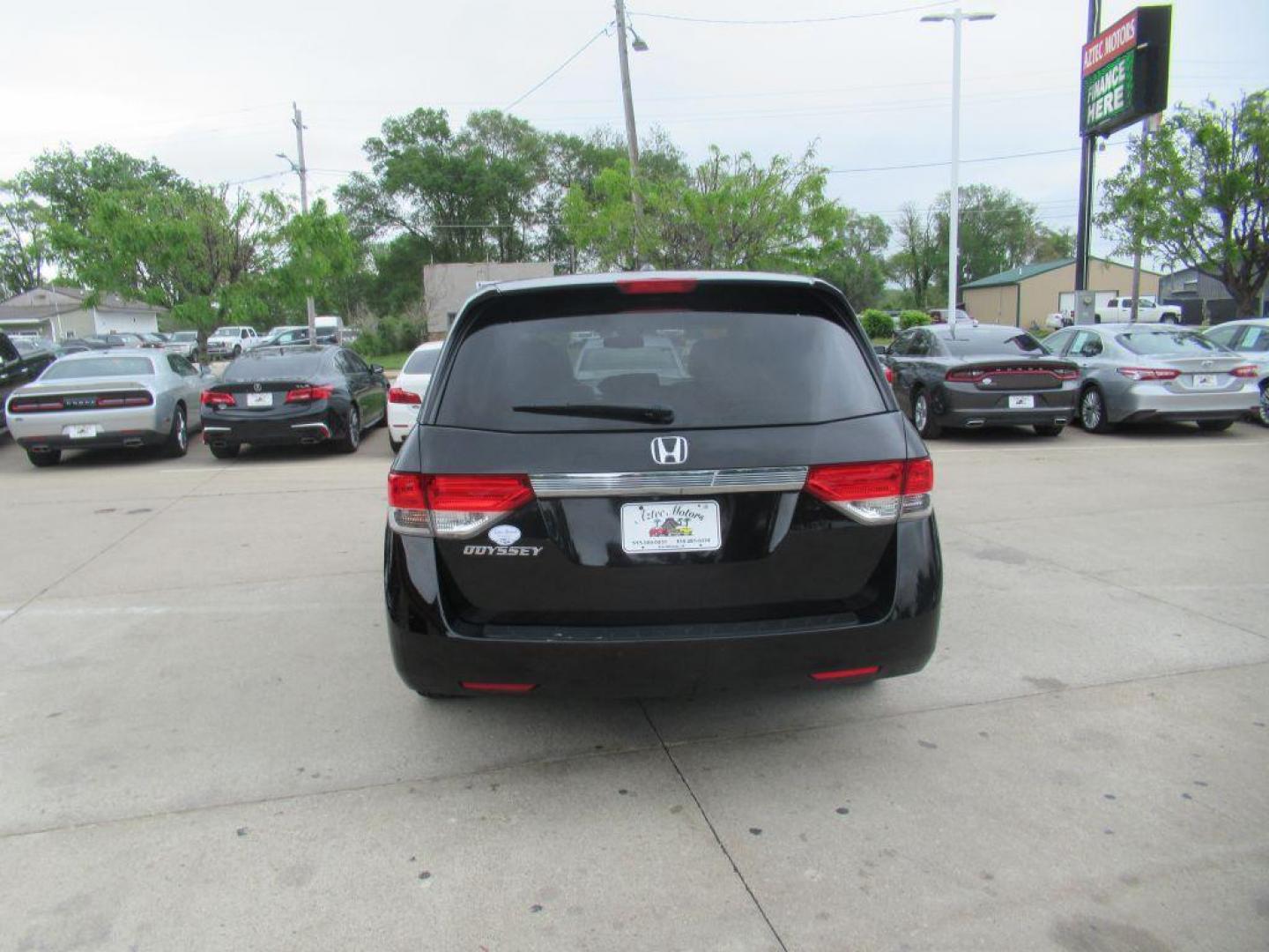 2014 BLACK HONDA ODYSSEY EXL (5FNRL5H64EB) with an 3.5L engine, Automatic transmission, located at 908 SE 14th Street, Des Moines, IA, 50317, (515) 281-0330, 41.580303, -93.597046 - Photo#5