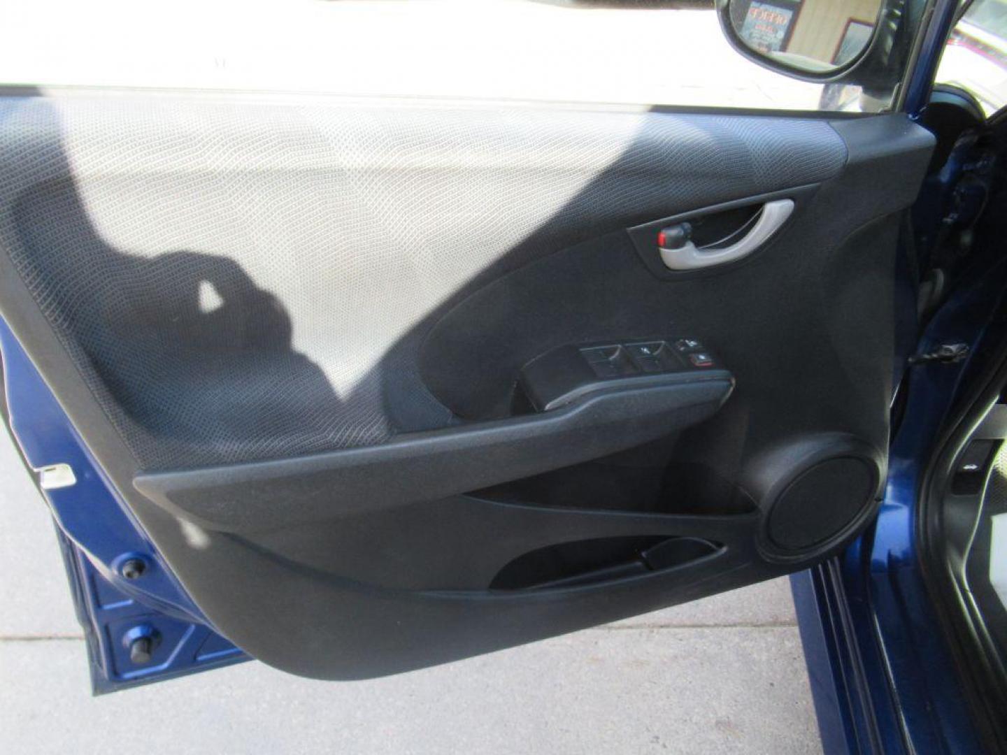 2011 BLUE HONDA FIT SPORT (JHMGE8H51BC) with an 1.5L engine, Automatic transmission, located at 908 SE 14th Street, Des Moines, IA, 50317, (515) 281-0330, 41.580303, -93.597046 - Photo#9