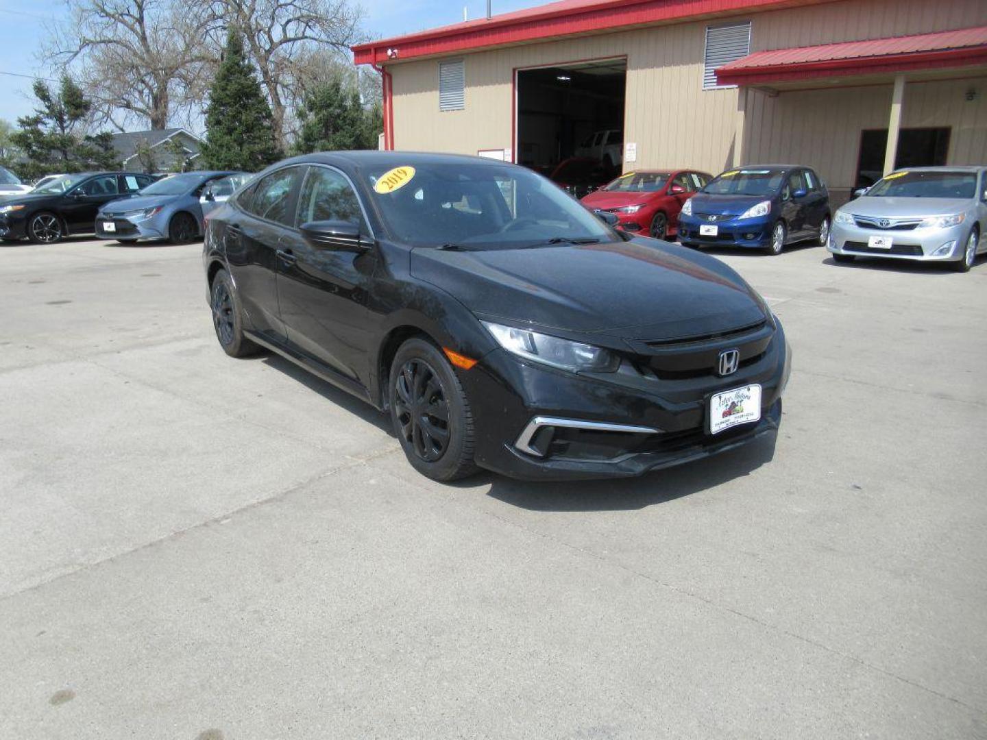 2019 BLACK HONDA CIVIC LX (2HGFC2F68KH) with an 2.0L engine, Continuously Variable transmission, located at 908 SE 14th Street, Des Moines, IA, 50317, (515) 281-0330, 41.580303, -93.597046 - Photo#2
