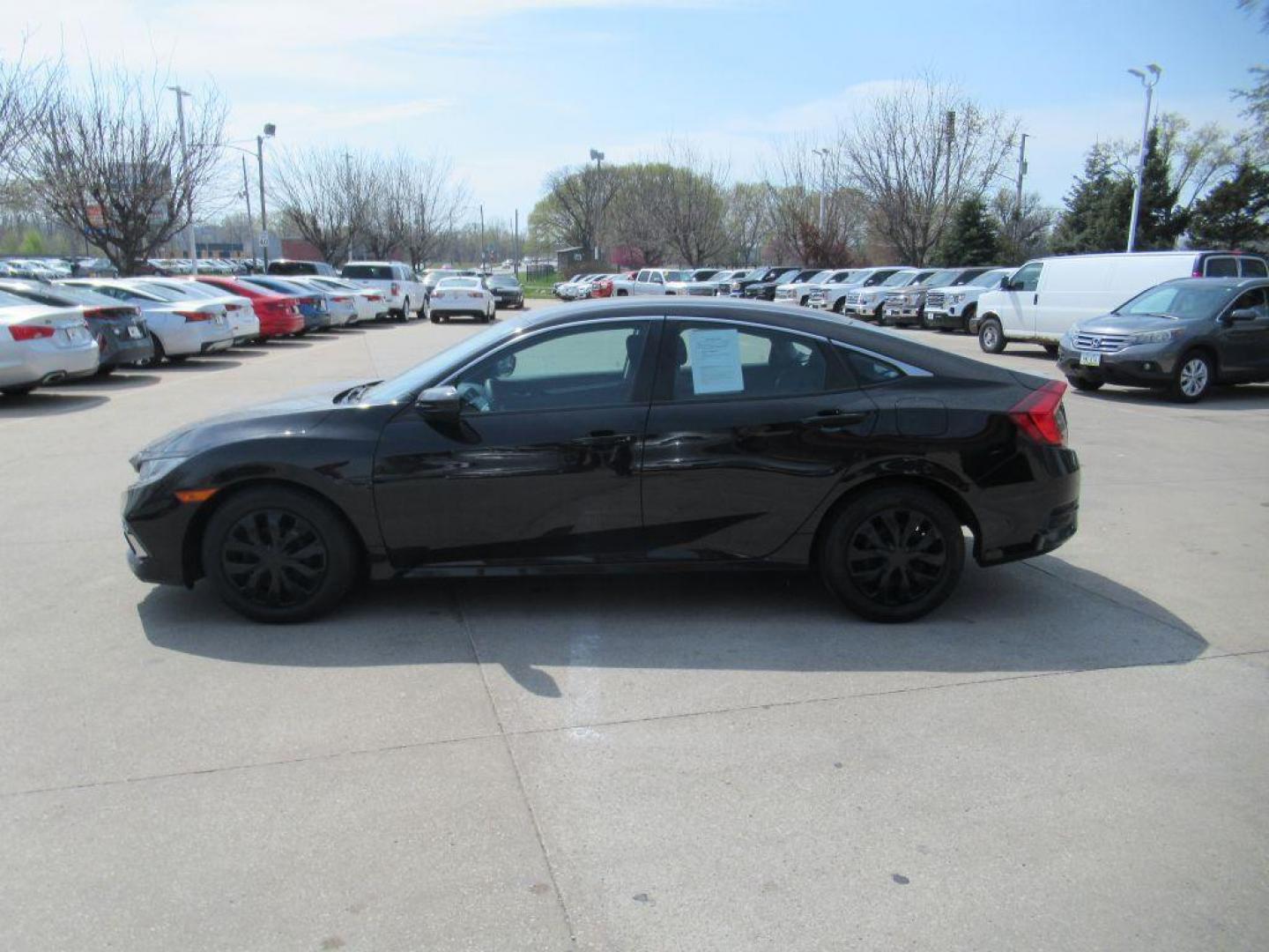 2019 BLACK HONDA CIVIC LX (2HGFC2F68KH) with an 2.0L engine, Continuously Variable transmission, located at 908 SE 14th Street, Des Moines, IA, 50317, (515) 281-0330, 41.580303, -93.597046 - Photo#7