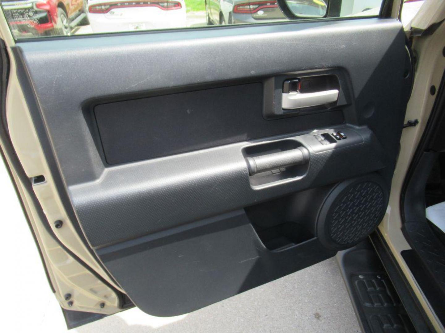 2012 GOLD TOYOTA FJ CRUISER (JTEBU4BF0CK) with an 4.0L engine, Automatic transmission, located at 908 SE 14th Street, Des Moines, IA, 50317, (515) 281-0330, 41.580303, -93.597046 - Photo#9
