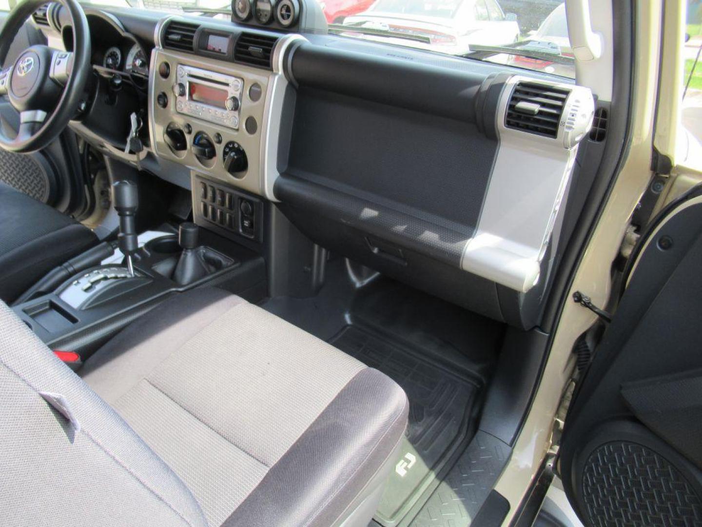 2012 GOLD TOYOTA FJ CRUISER (JTEBU4BF0CK) with an 4.0L engine, Automatic transmission, located at 908 SE 14th Street, Des Moines, IA, 50317, (515) 281-0330, 41.580303, -93.597046 - Photo#13