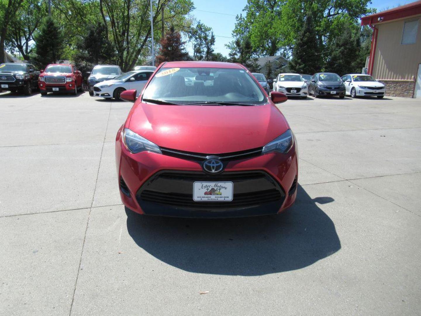 2018 RED TOYOTA COROLLA L (5YFBURHE2JP) with an 1.8L engine, Continuously Variable transmission, located at 908 SE 14th Street, Des Moines, IA, 50317, (515) 281-0330, 41.580303, -93.597046 - Photo#1