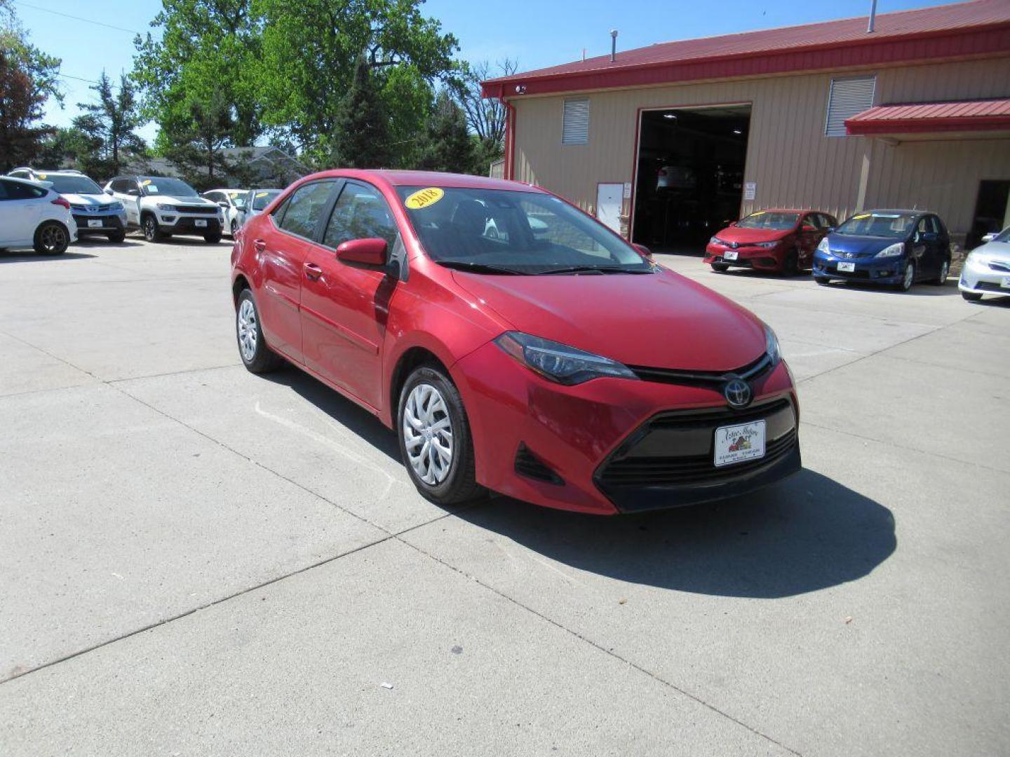 2018 RED TOYOTA COROLLA L (5YFBURHE2JP) with an 1.8L engine, Continuously Variable transmission, located at 908 SE 14th Street, Des Moines, IA, 50317, (515) 281-0330, 41.580303, -93.597046 - Photo#2