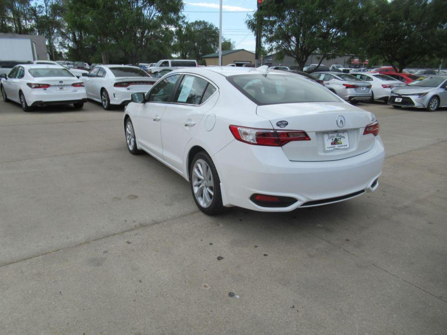 2017 WHITE ACURA ILX PREMIUM (19UDE2F70HA) with an 2.4L engine, Automatic transmission, located at 908 SE 14th Street, Des Moines, IA, 50317, (515) 281-0330, 41.580303, -93.597046 - Photo#6