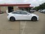 2021 WHITE TESLA MODEL 3 (5YJ3E1EB4MF) , Continuously Variable transmission, located at 908 SE 14th Street, Des Moines, IA, 50317, (515) 281-0330, 41.580303, -93.597046 - Photo#3