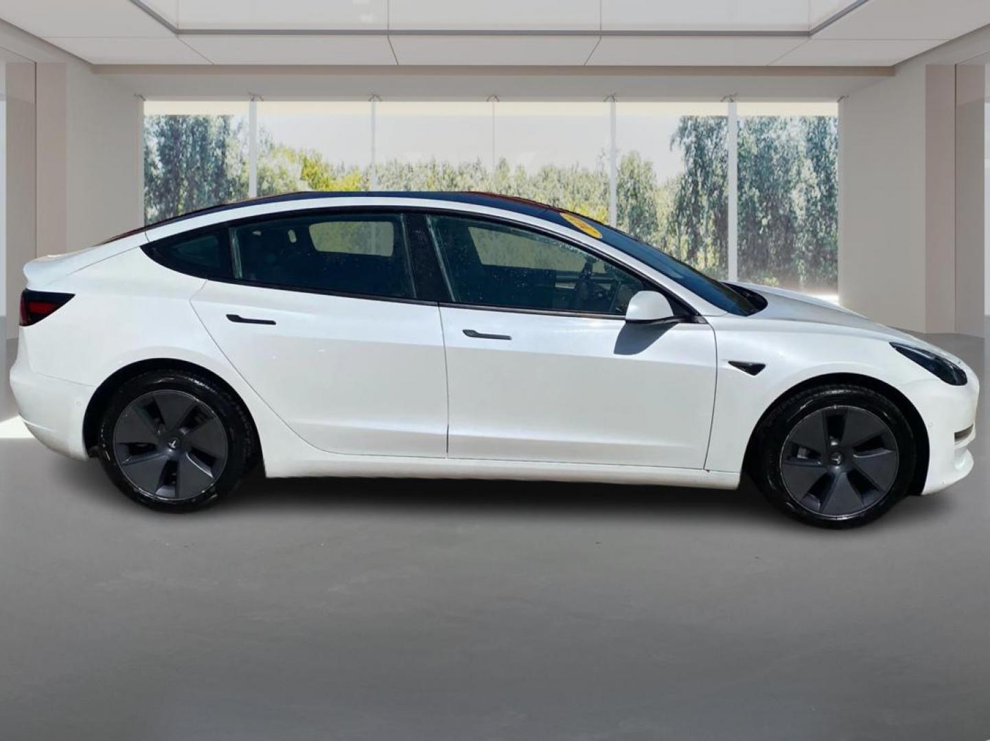 2021 WHITE TESLA MODEL 3 (5YJ3E1EB4MF) , Continuously Variable transmission, located at 908 SE 14th Street, Des Moines, IA, 50317, (515) 281-0330, 41.580303, -93.597046 - Photo#1