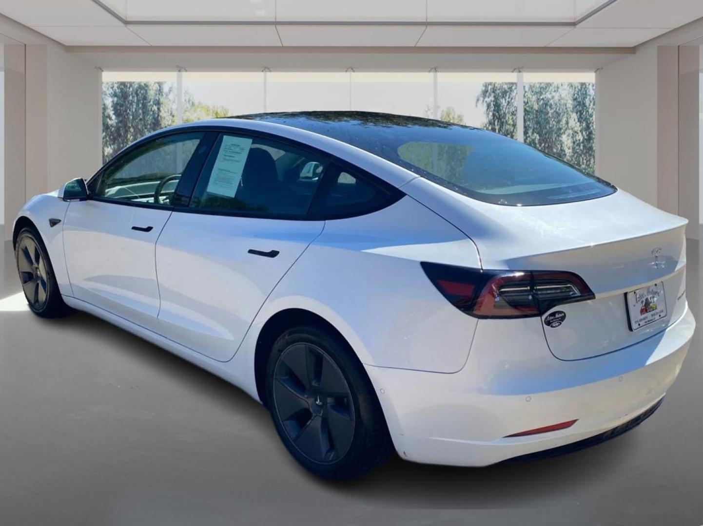 2021 WHITE TESLA MODEL 3 (5YJ3E1EB4MF) , Continuously Variable transmission, located at 908 SE 14th Street, Des Moines, IA, 50317, (515) 281-0330, 41.580303, -93.597046 - Photo#4
