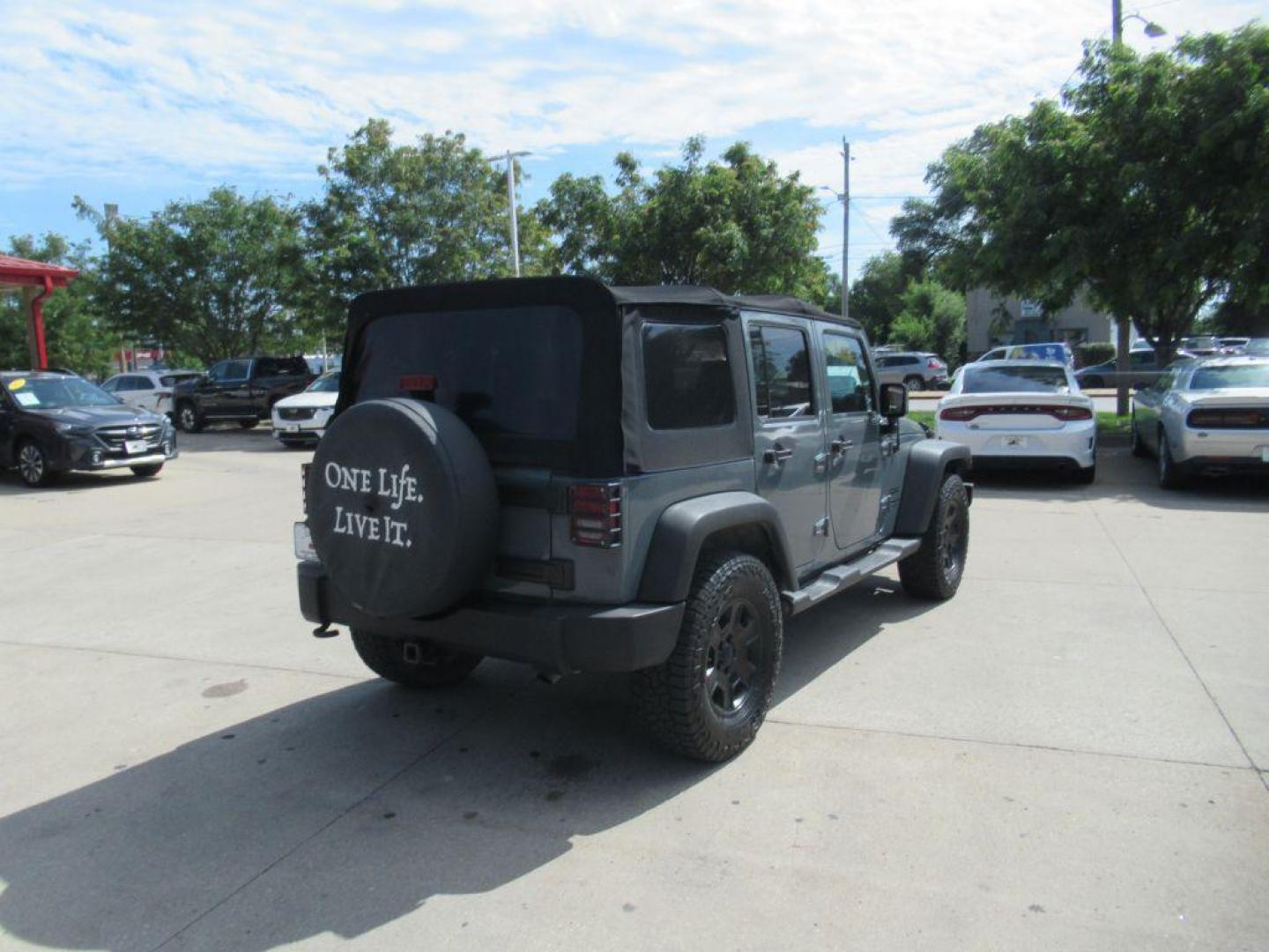 2014 GRAY JEEP WRANGLER UNLIMI SPORT (1C4BJWDGXEL) with an 3.6L engine, Automatic transmission, located at 908 SE 14th Street, Des Moines, IA, 50317, (515) 281-0330, 41.580303, -93.597046 - Photo#4