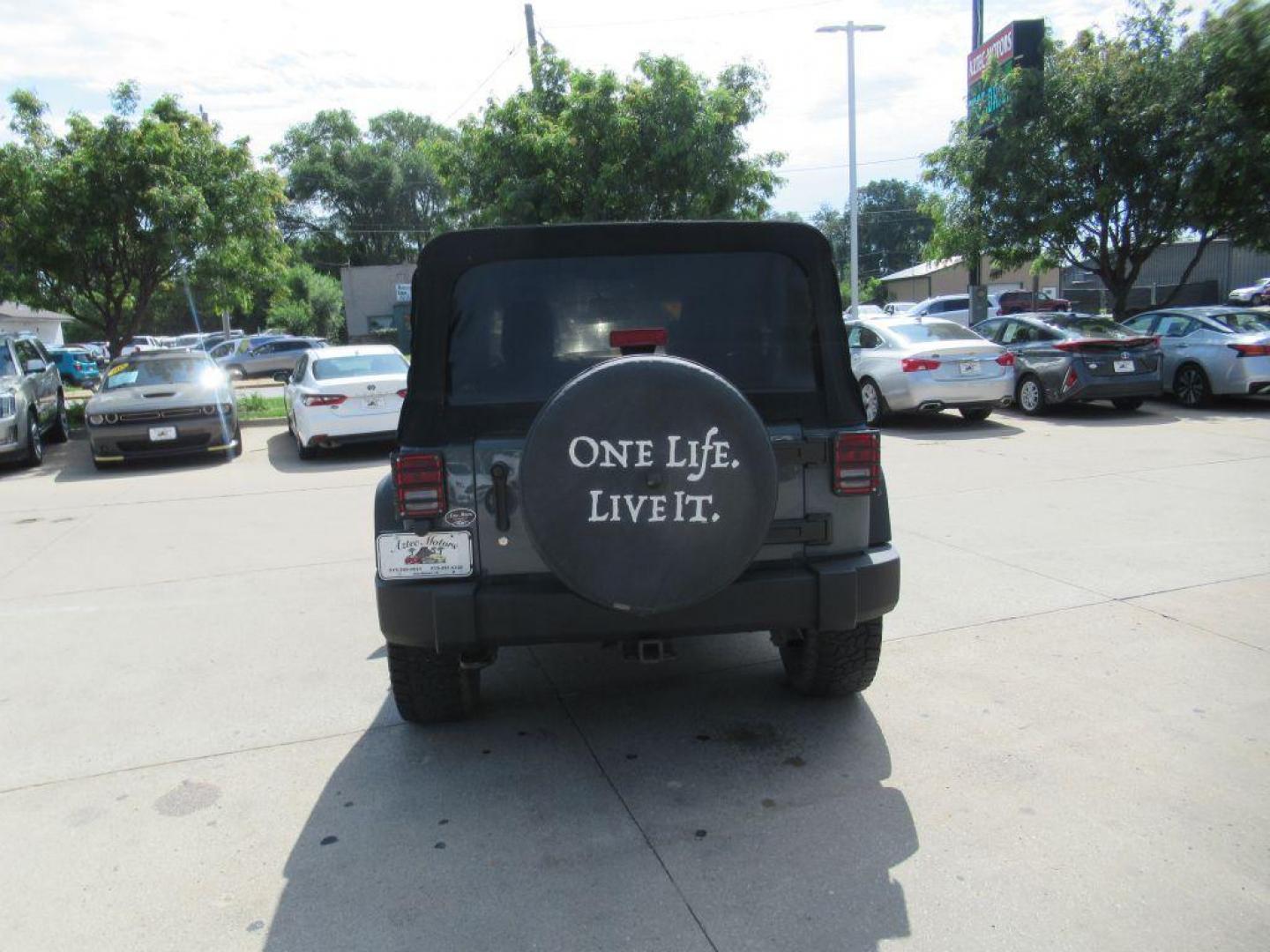 2014 GRAY JEEP WRANGLER UNLIMI SPORT (1C4BJWDGXEL) with an 3.6L engine, Automatic transmission, located at 908 SE 14th Street, Des Moines, IA, 50317, (515) 281-0330, 41.580303, -93.597046 - Photo#5