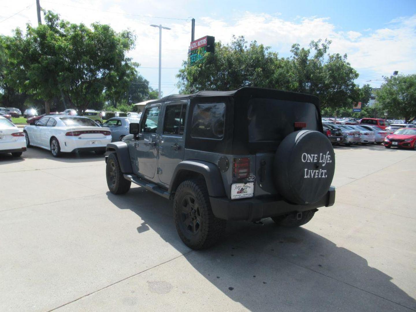 2014 GRAY JEEP WRANGLER UNLIMI SPORT (1C4BJWDGXEL) with an 3.6L engine, Automatic transmission, located at 908 SE 14th Street, Des Moines, IA, 50317, (515) 281-0330, 41.580303, -93.597046 - Photo#6