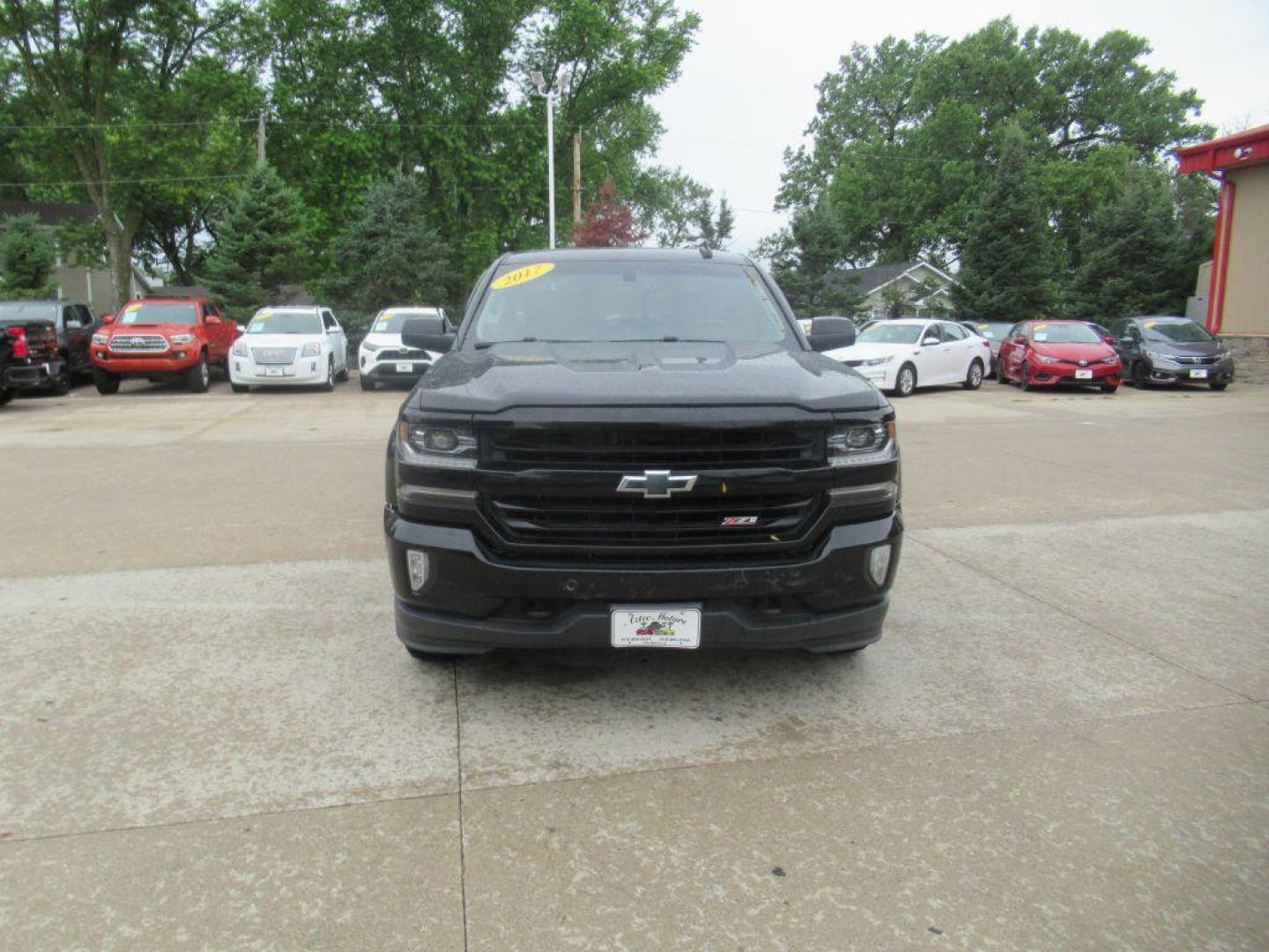 2017 BLACK CHEVROLET SILVERADO 1500 LTZ (3GCUKSEC6HG) with an 5.3L engine, Automatic transmission, located at 908 SE 14th Street, Des Moines, IA, 50317, (515) 281-0330, 41.580303, -93.597046 - Photo#1