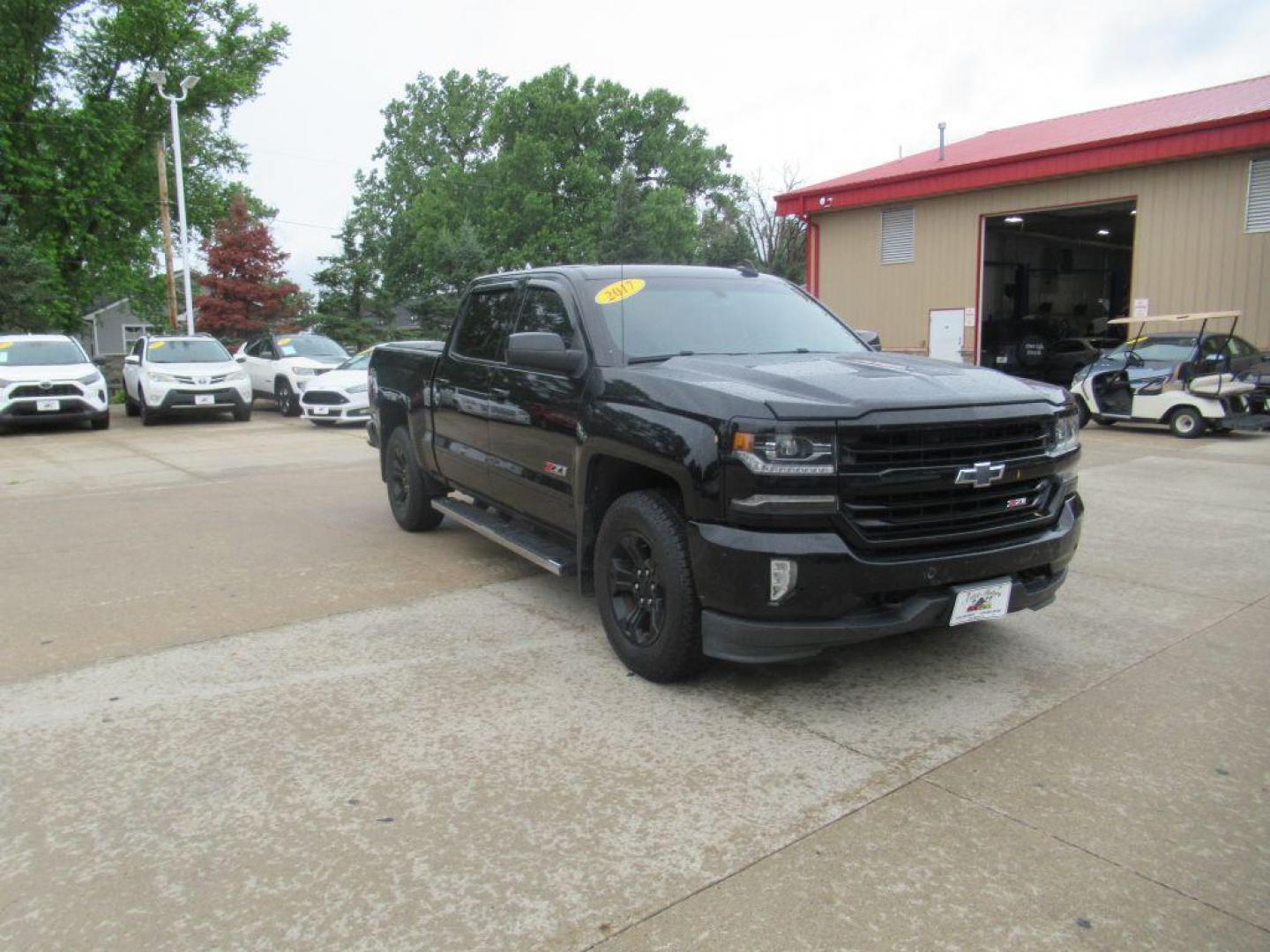 2017 BLACK CHEVROLET SILVERADO 1500 LTZ (3GCUKSEC6HG) with an 5.3L engine, Automatic transmission, located at 908 SE 14th Street, Des Moines, IA, 50317, (515) 281-0330, 41.580303, -93.597046 - Photo#2