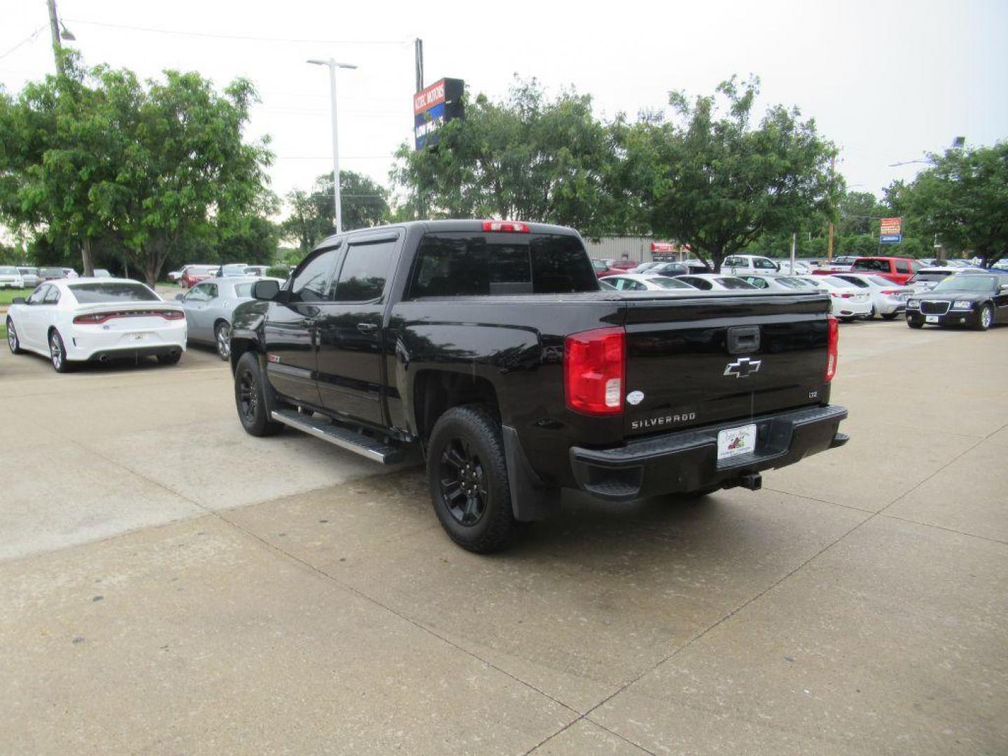 2017 BLACK CHEVROLET SILVERADO 1500 LTZ (3GCUKSEC6HG) with an 5.3L engine, Automatic transmission, located at 908 SE 14th Street, Des Moines, IA, 50317, (515) 281-0330, 41.580303, -93.597046 - Photo#6