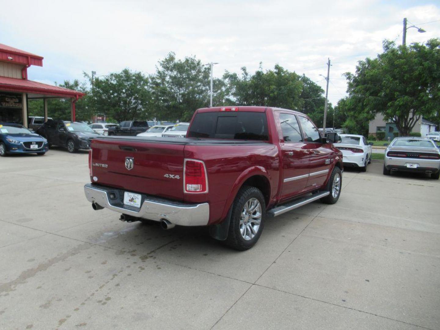 2015 MARRON RAM 1500 LONGHORN (1C6RR7PT0FS) with an 5.7L engine, Automatic transmission, located at 908 SE 14th Street, Des Moines, IA, 50317, (515) 281-0330, 41.580303, -93.597046 - Photo#4