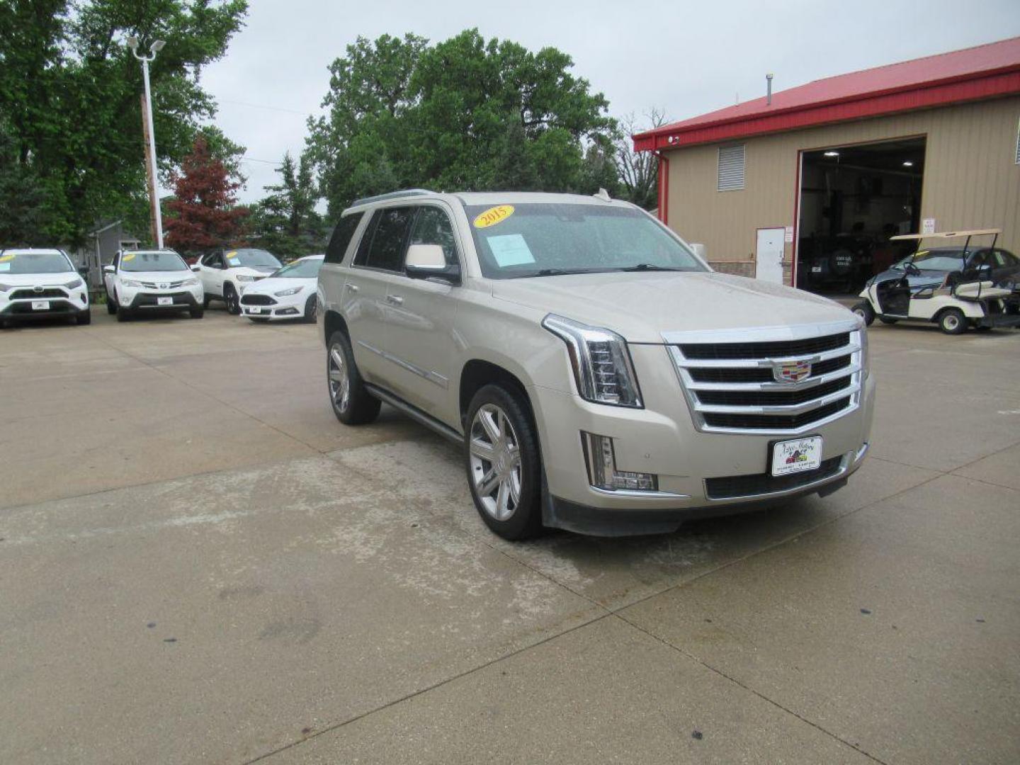 2015 GOLD CADILLAC ESCALADE PREMIUM (1GYS4NKJ4FR) with an 6.2L engine, Automatic transmission, located at 908 SE 14th Street, Des Moines, IA, 50317, (515) 281-0330, 41.580303, -93.597046 - Photo#2
