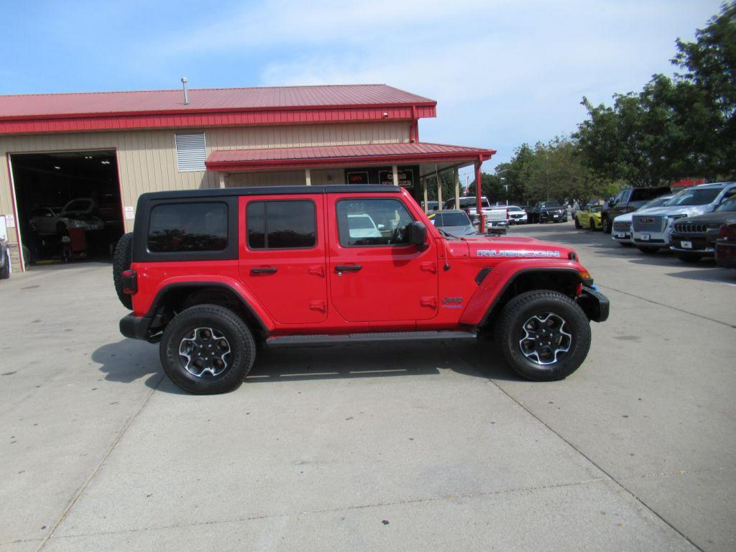 2022 RED JEEP WRANGLER UNLIMI RUBICON 4XE (1C4JJXR63NW) with an 2.0L engine, Automatic transmission, located at 908 SE 14th Street, Des Moines, IA, 50317, (515) 281-0330, 41.580303, -93.597046 - Photo#3