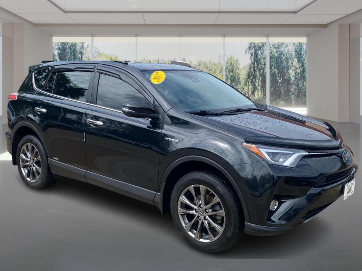 2017 BLACK TOYOTA RAV4 HV LIMITED (JTMDJREV0HD) with an 2.5L engine, Continuously Variable transmission, located at 908 SE 14th Street, Des Moines, IA, 50317, (515) 281-0330, 41.580303, -93.597046 - Photo#0