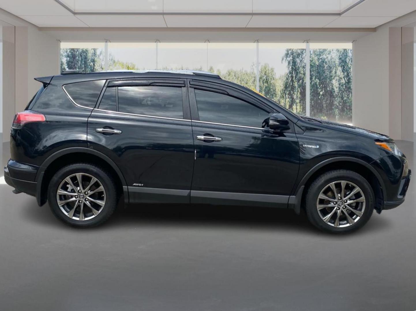 2017 BLACK TOYOTA RAV4 HV LIMITED (JTMDJREV0HD) with an 2.5L engine, Continuously Variable transmission, located at 908 SE 14th Street, Des Moines, IA, 50317, (515) 281-0330, 41.580303, -93.597046 - Photo#1