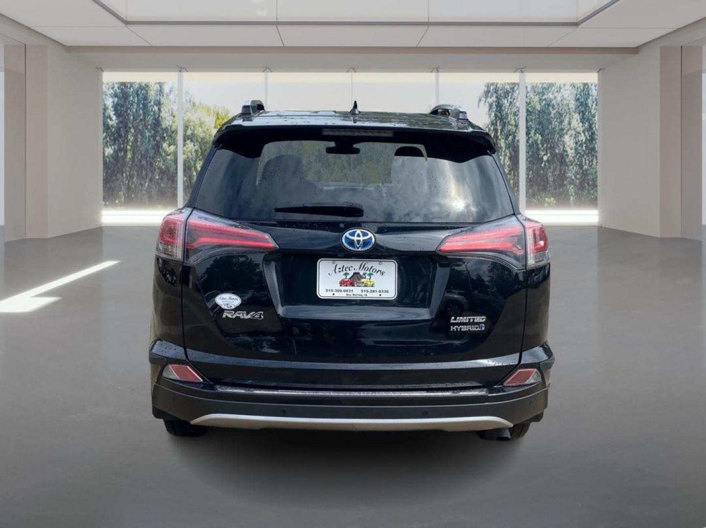 2017 BLACK TOYOTA RAV4 HV LIMITED (JTMDJREV0HD) with an 2.5L engine, Continuously Variable transmission, located at 908 SE 14th Street, Des Moines, IA, 50317, (515) 281-0330, 41.580303, -93.597046 - Photo#3