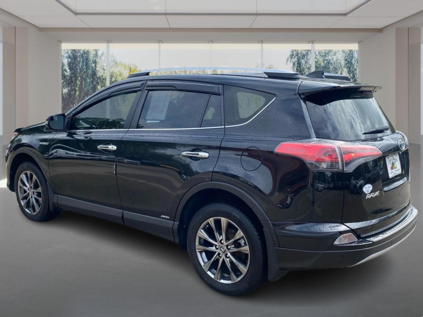 2017 BLACK TOYOTA RAV4 HV LIMITED (JTMDJREV0HD) with an 2.5L engine, Continuously Variable transmission, located at 908 SE 14th Street, Des Moines, IA, 50317, (515) 281-0330, 41.580303, -93.597046 - Photo#4