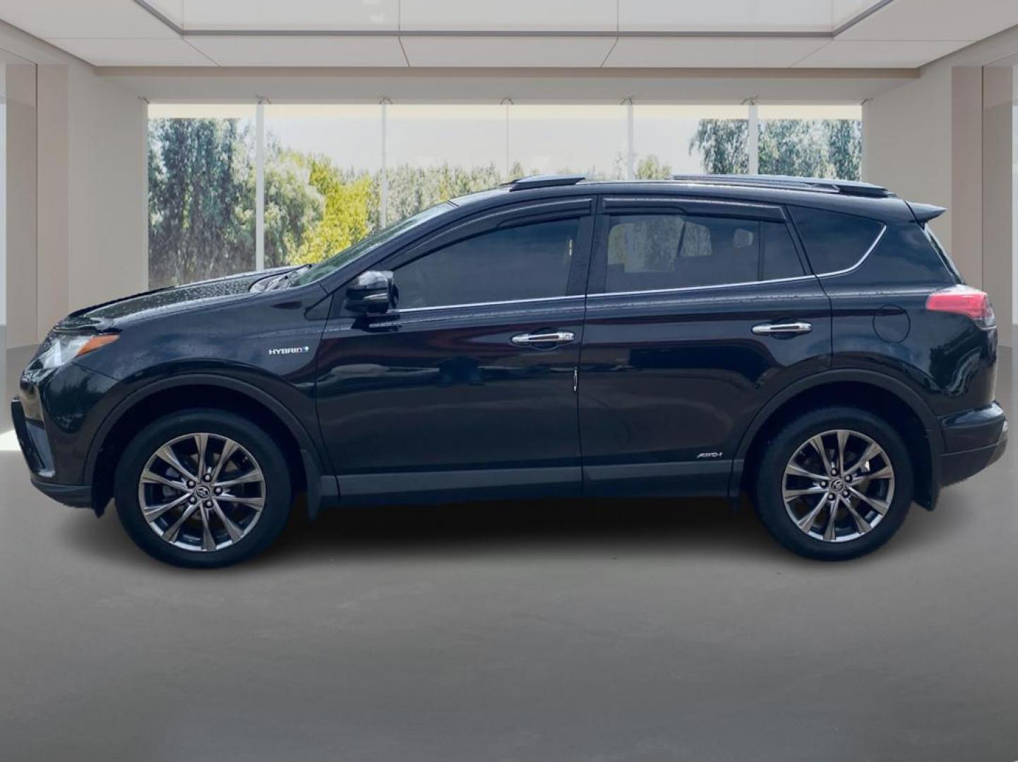 2017 BLACK TOYOTA RAV4 HV LIMITED (JTMDJREV0HD) with an 2.5L engine, Continuously Variable transmission, located at 908 SE 14th Street, Des Moines, IA, 50317, (515) 281-0330, 41.580303, -93.597046 - Photo#5