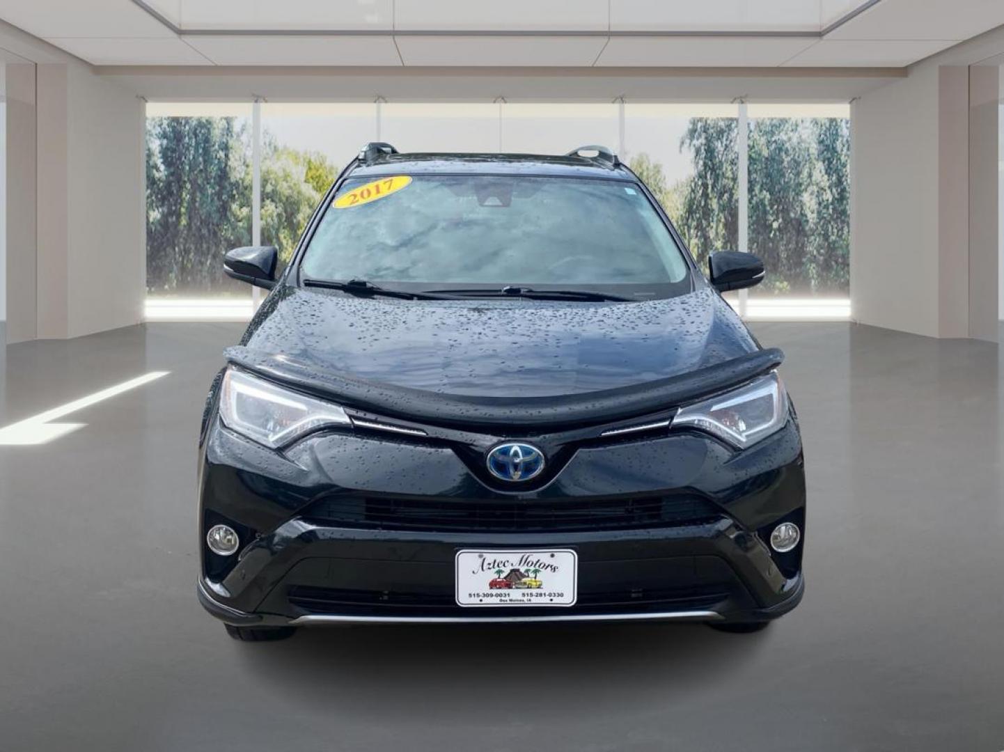 2017 BLACK TOYOTA RAV4 HV LIMITED (JTMDJREV0HD) with an 2.5L engine, Continuously Variable transmission, located at 908 SE 14th Street, Des Moines, IA, 50317, (515) 281-0330, 41.580303, -93.597046 - Photo#6