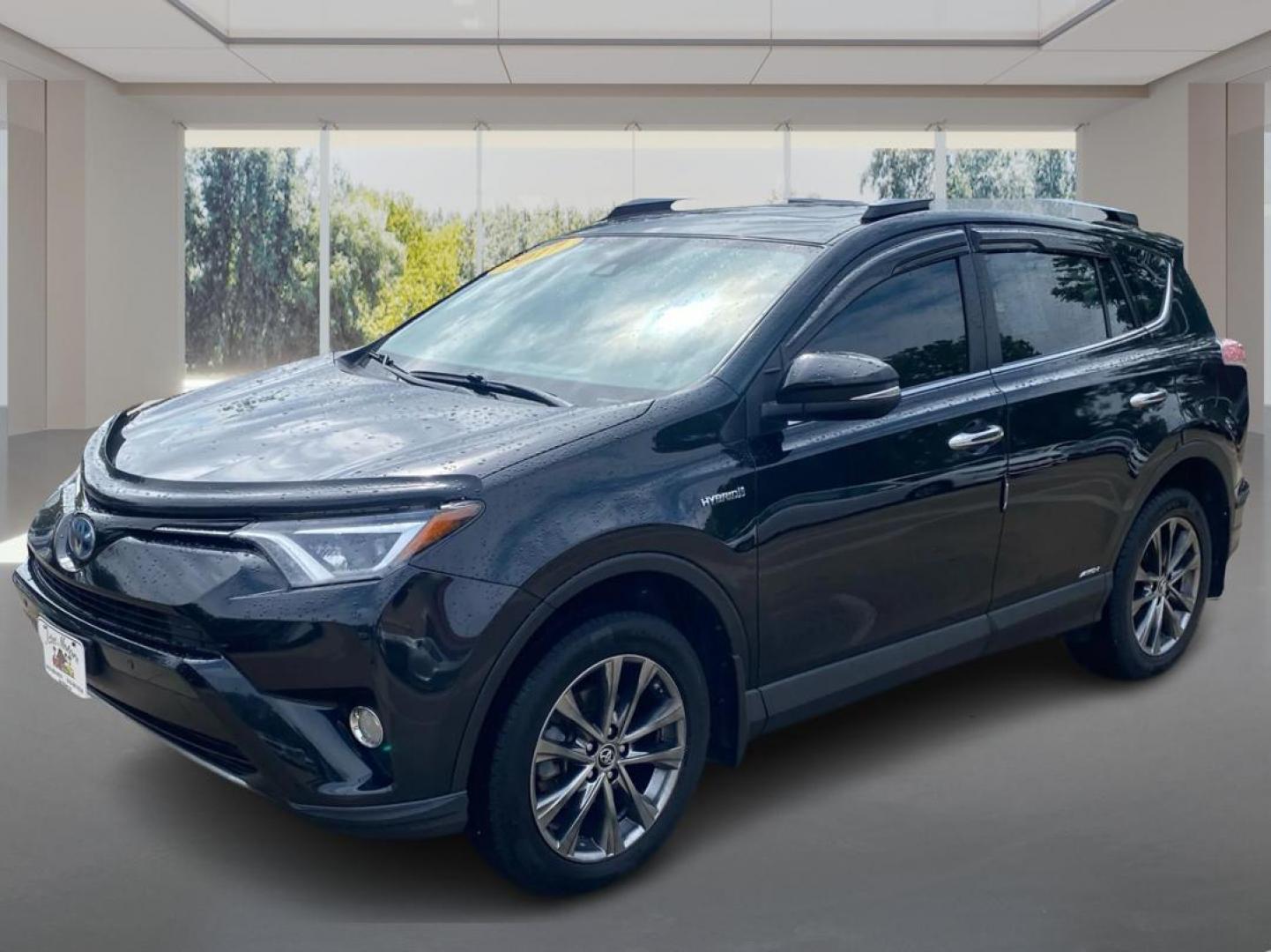 2017 BLACK TOYOTA RAV4 HV LIMITED (JTMDJREV0HD) with an 2.5L engine, Continuously Variable transmission, located at 908 SE 14th Street, Des Moines, IA, 50317, (515) 281-0330, 41.580303, -93.597046 - Photo#7