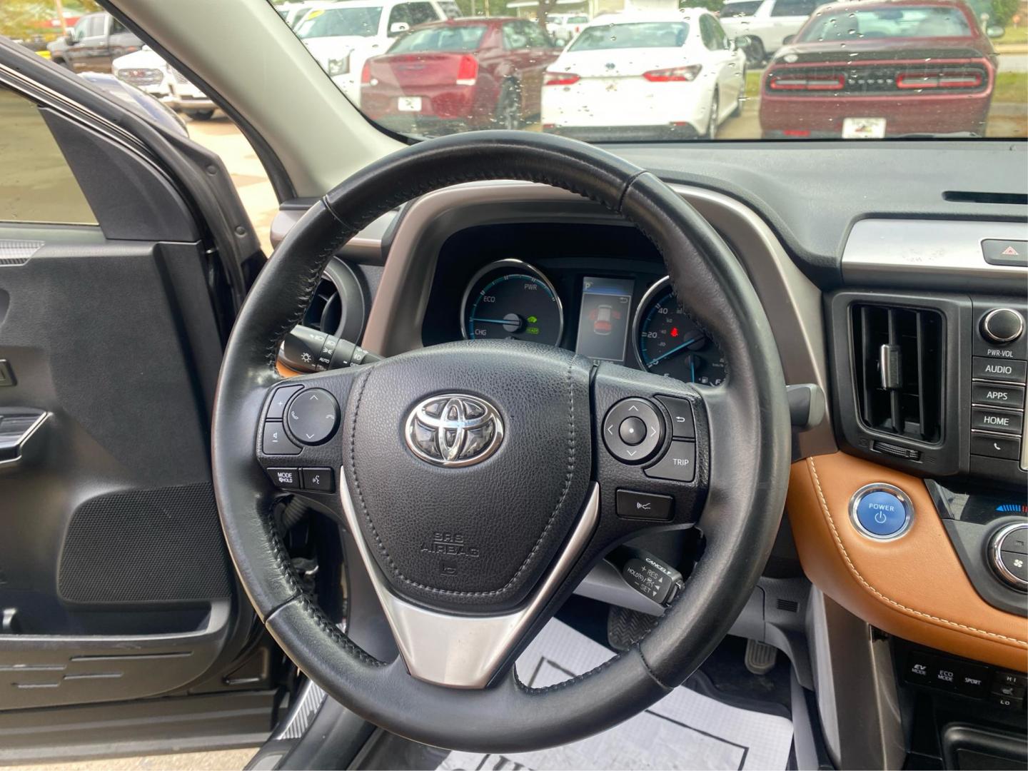 2017 BLACK TOYOTA RAV4 HV LIMITED (JTMDJREV0HD) with an 2.5L engine, Continuously Variable transmission, located at 908 SE 14th Street, Des Moines, IA, 50317, (515) 281-0330, 41.580303, -93.597046 - Photo#9