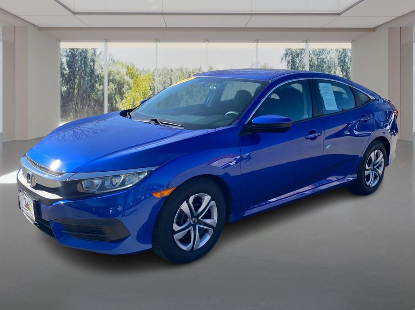 2018 BLUE HONDA CIVIC LX (19XFC2F55JE) with an 2.0L engine, Continuously Variable transmission, located at 908 SE 14th Street, Des Moines, IA, 50317, (515) 281-0330, 41.580303, -93.597046 - Photo#7