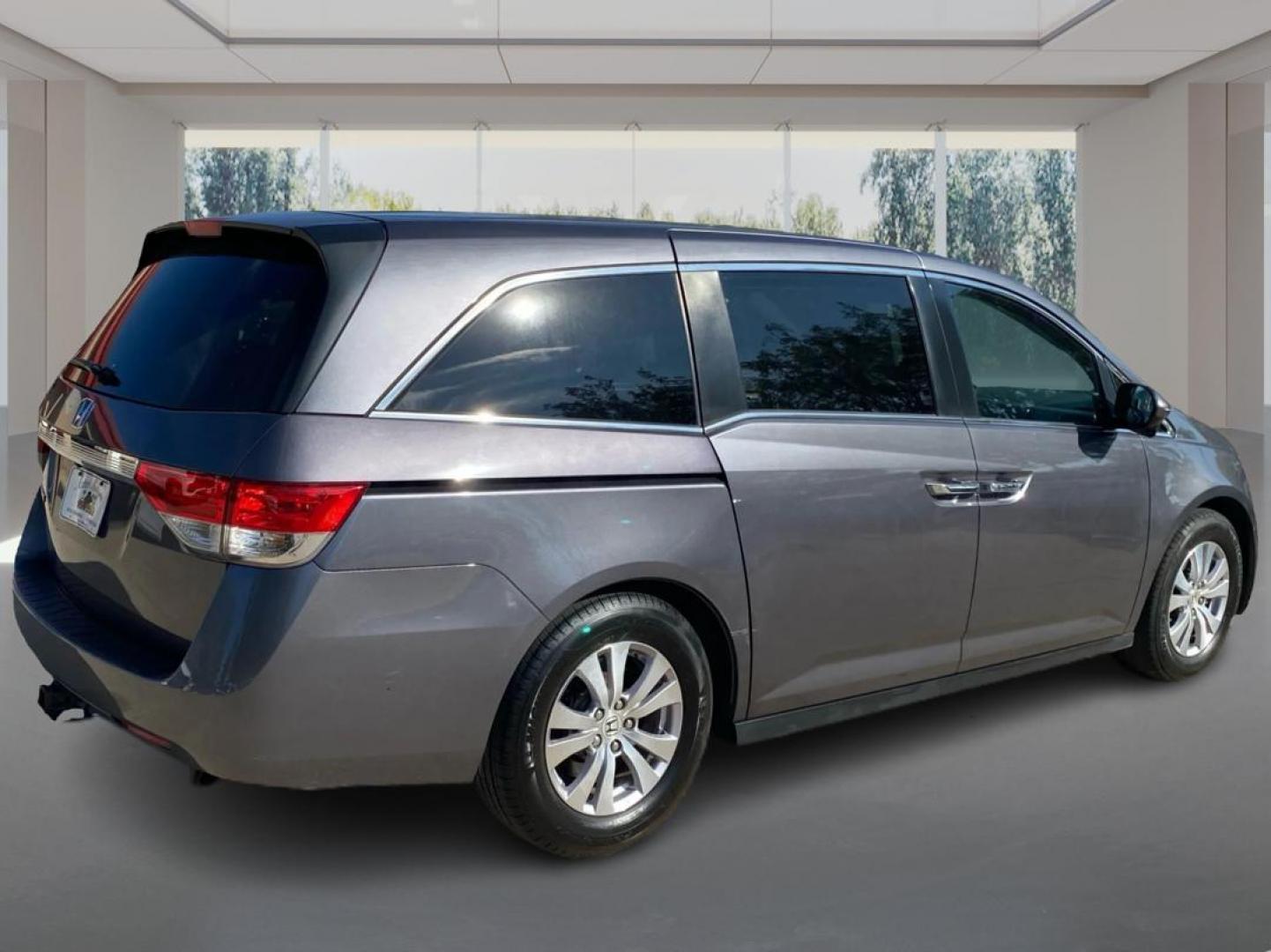 2016 GRAY HONDA ODYSSEY EXL (5FNRL5H68GB) with an 3.5L engine, Automatic transmission, located at 908 SE 14th Street, Des Moines, IA, 50317, (515) 281-0330, 41.580303, -93.597046 - Photo#2
