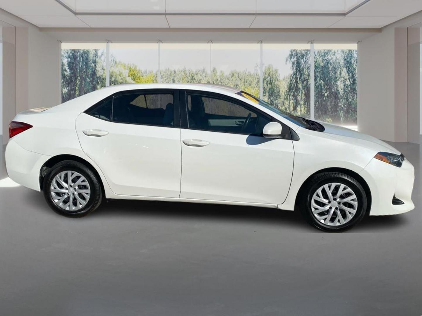 2018 WHITE TOYOTA COROLLA L (5YFBURHE5JP) with an 1.8L engine, Continuously Variable transmission, located at 908 SE 14th Street, Des Moines, IA, 50317, (515) 281-0330, 41.580303, -93.597046 - Photo#1