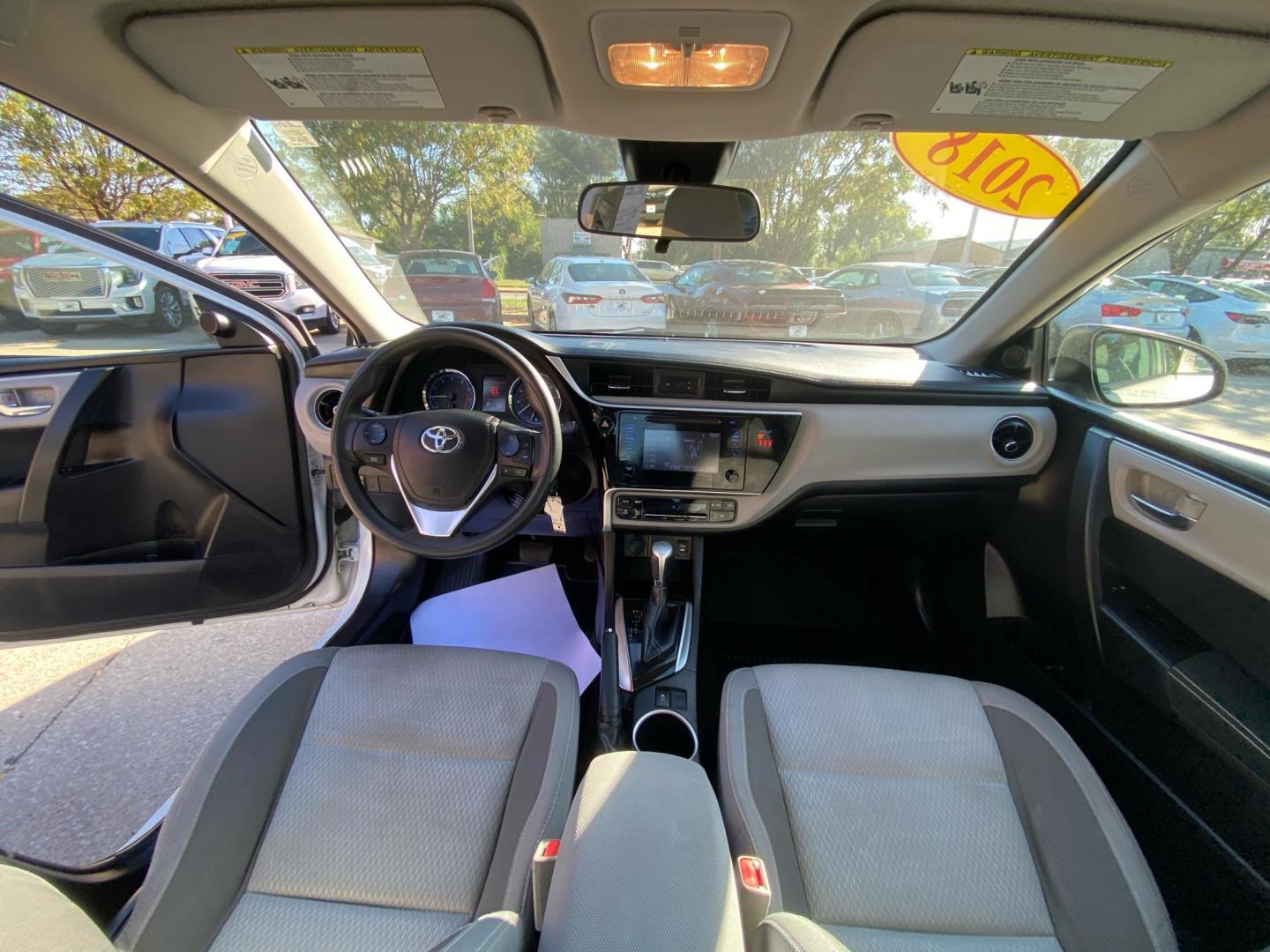 2018 WHITE TOYOTA COROLLA L (5YFBURHE5JP) with an 1.8L engine, Continuously Variable transmission, located at 908 SE 14th Street, Des Moines, IA, 50317, (515) 281-0330, 41.580303, -93.597046 - Photo#21